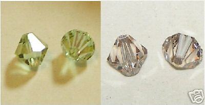 pkg of 14 SWAROVSKI 4MM CANTALOUPE CRYSTAL BICONE BEADS  