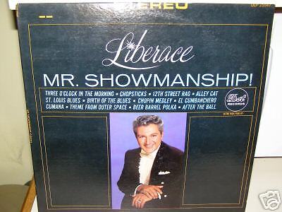 AUTOGRAPHED LIBERACE LP (SYLVIA SYMS COLLECTION)  