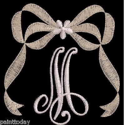 This set includes all capital letters as shown, with a large bow. The 