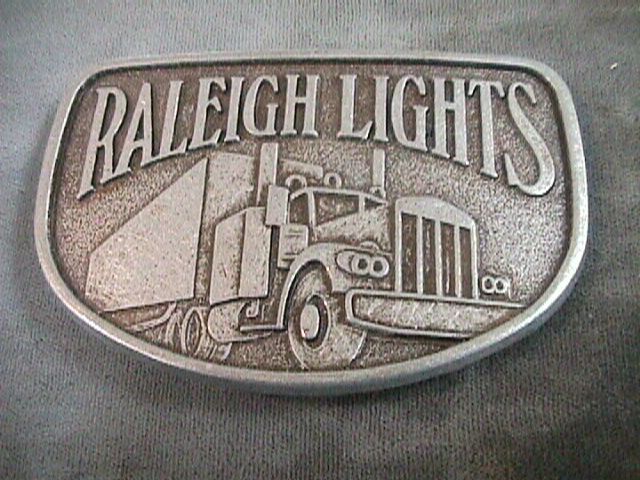 NICE RALEIGH LIGHTS 18 WHEELER BELT BUCKLE  