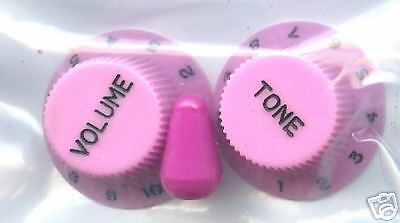 set of pink guitar knobs and hot pink switch tip  